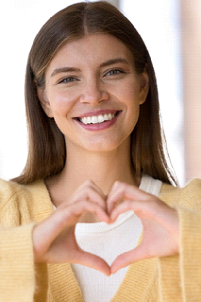 Woman smiling with CEREC in Austin