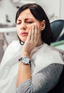 Woman experiencing tooth pain