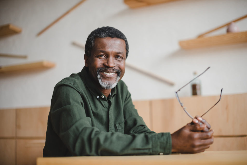 smiling person with dental implants